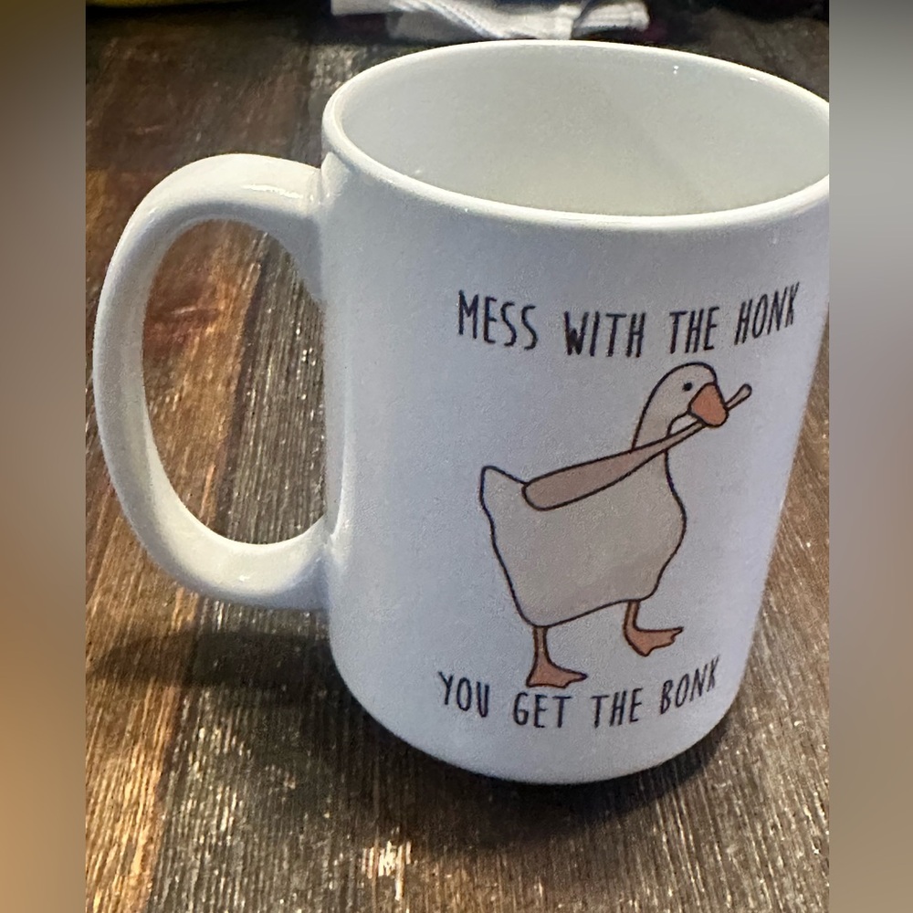 EUC funny Look Human coffee mug.  Very sturdy.